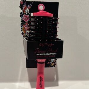 Ed Hardy Round Fast Blow-Dry Styling Brush that Adds Volume and Shine.